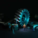 Mechanic under a lifted car inspecting the transmission area in a repair shop